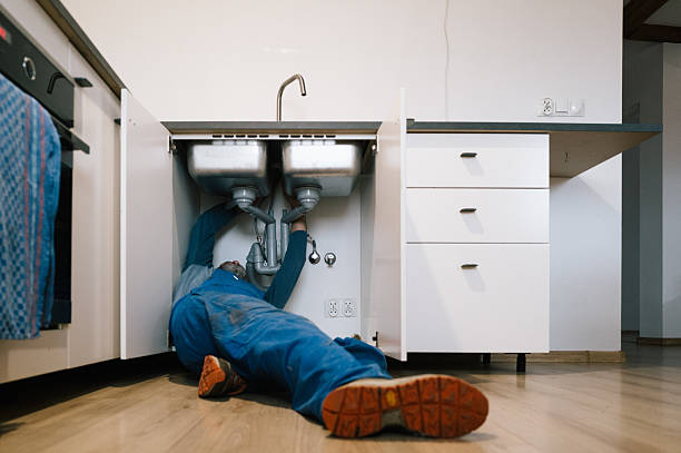 Professional Plumbing technician working in Long Grove, IA